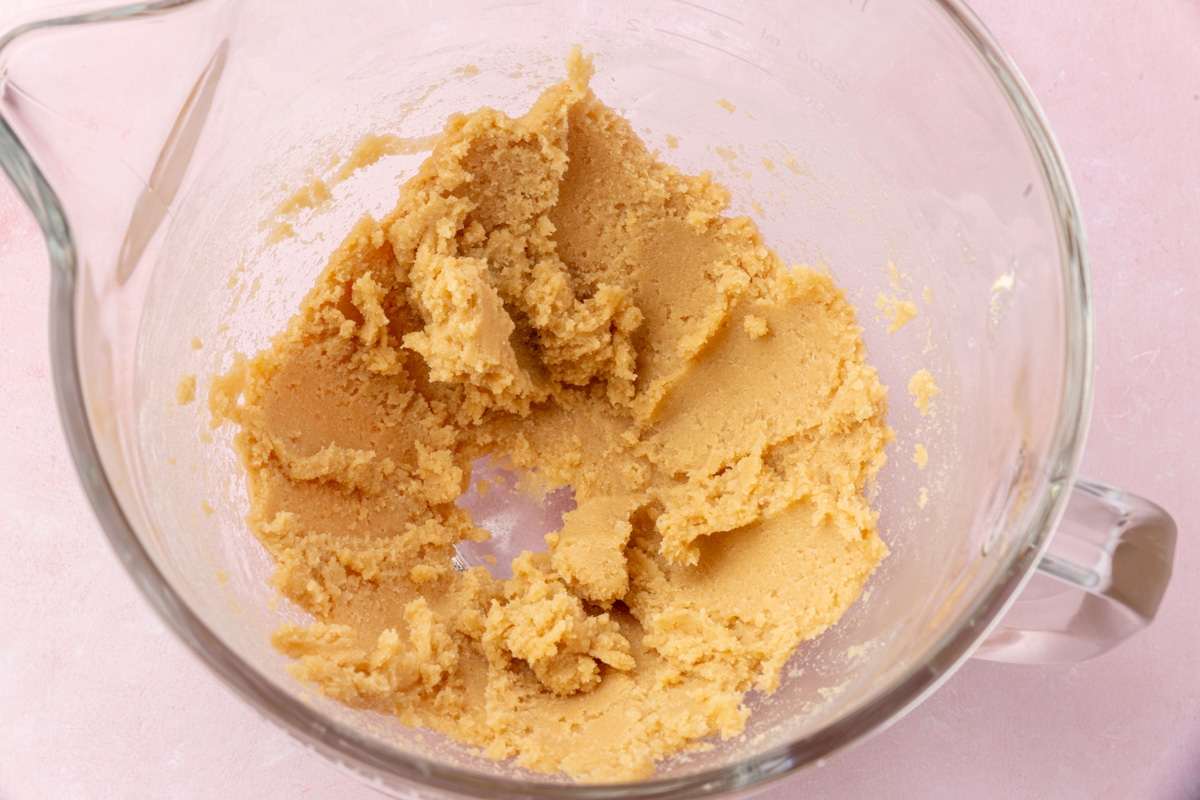 Creamed butter and sugars in a mixing bowl until light and fluffy.