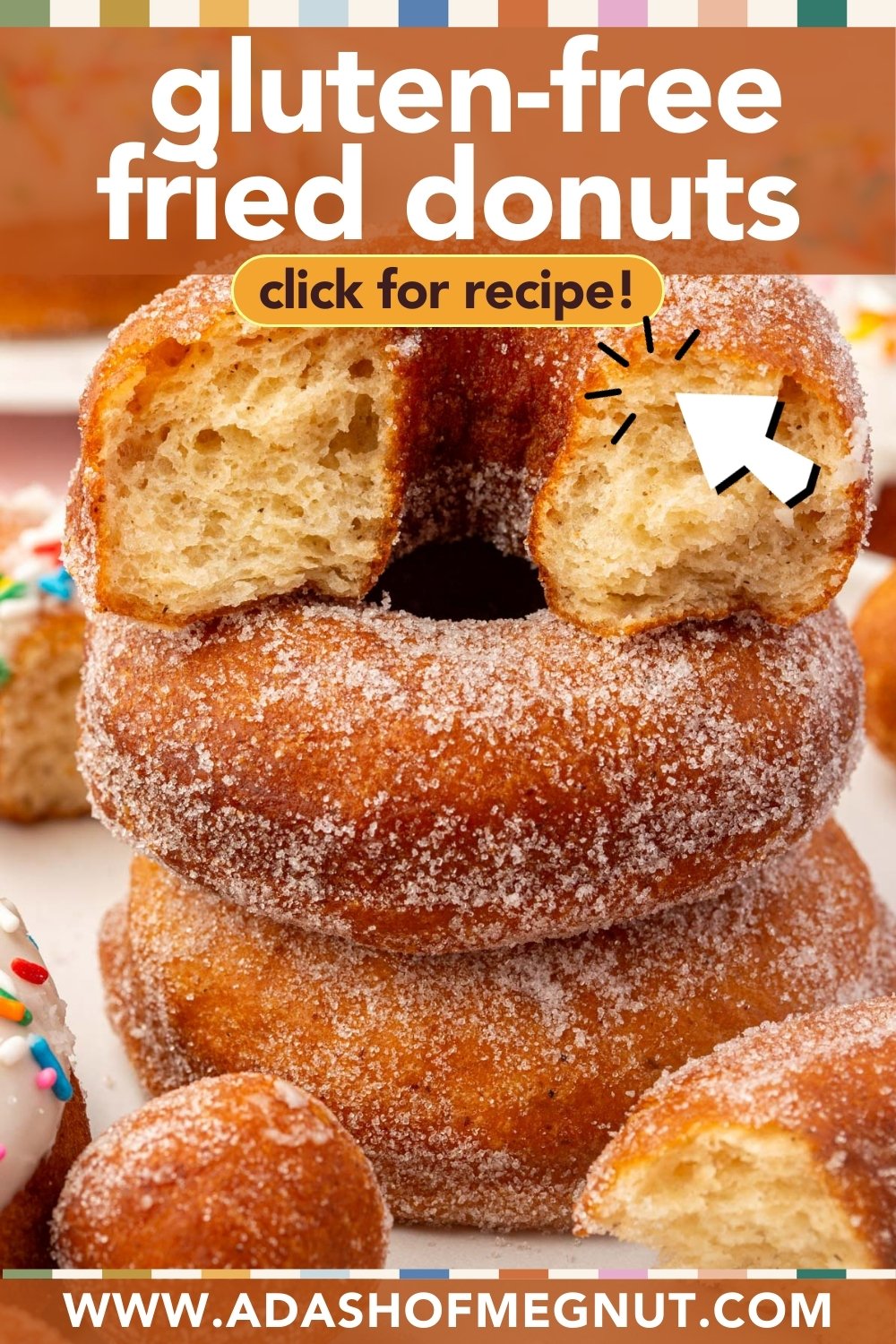 A stack of sugar-coated gluten-free fried donuts, with one donut on top bitten to show its fluffy inside. Colorful sprinkles and more donuts surround the stack. Text reads gluten-free fried donuts and prompts to click for the recipe.