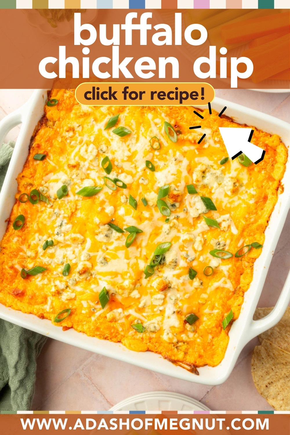 Overhead view of a baked buffalo chicken dip in a white casserole dish, topped with melted cheese and chopped green onions. Text reads โbuffalo chicken dip, click for recipe!โ and the website โadashofmegnut.com.โ.
