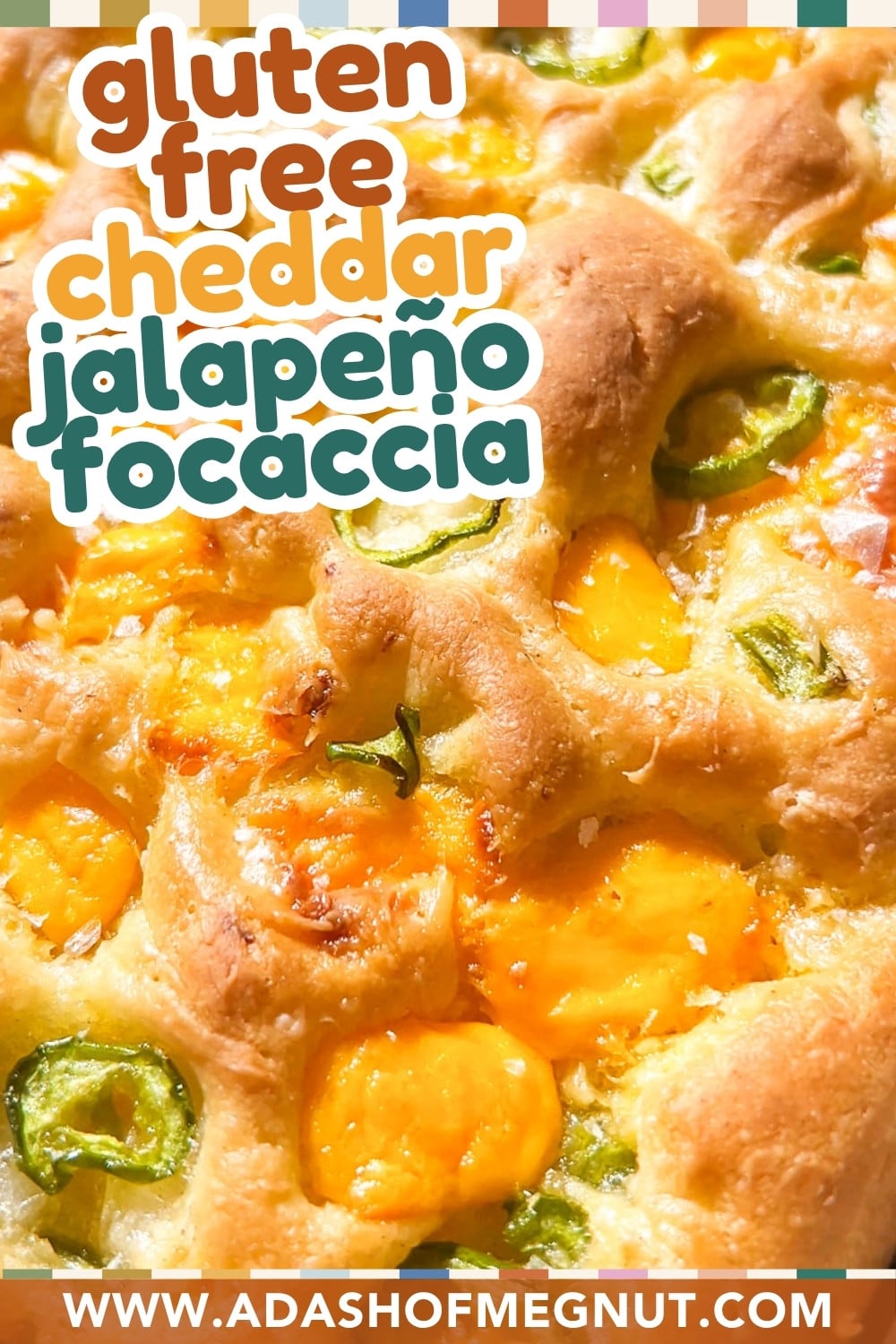 Close-up of golden baked focaccia topped with melted cheddar cheese and sliced jalapeños. Text on image reads “gluten free cheddar jalapeño focaccia.” Website URL appears at the bottom.
