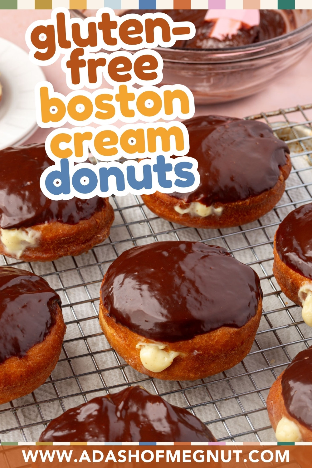 Gluten-free Boston cream donuts topped with chocolate glaze and filled with custard, displayed on a wire rack. Text reads, gluten-free boston cream donuts and www.adashofmegnut.com.