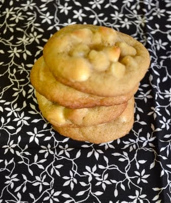 A stack of white chocolate macadamia nut cookies.